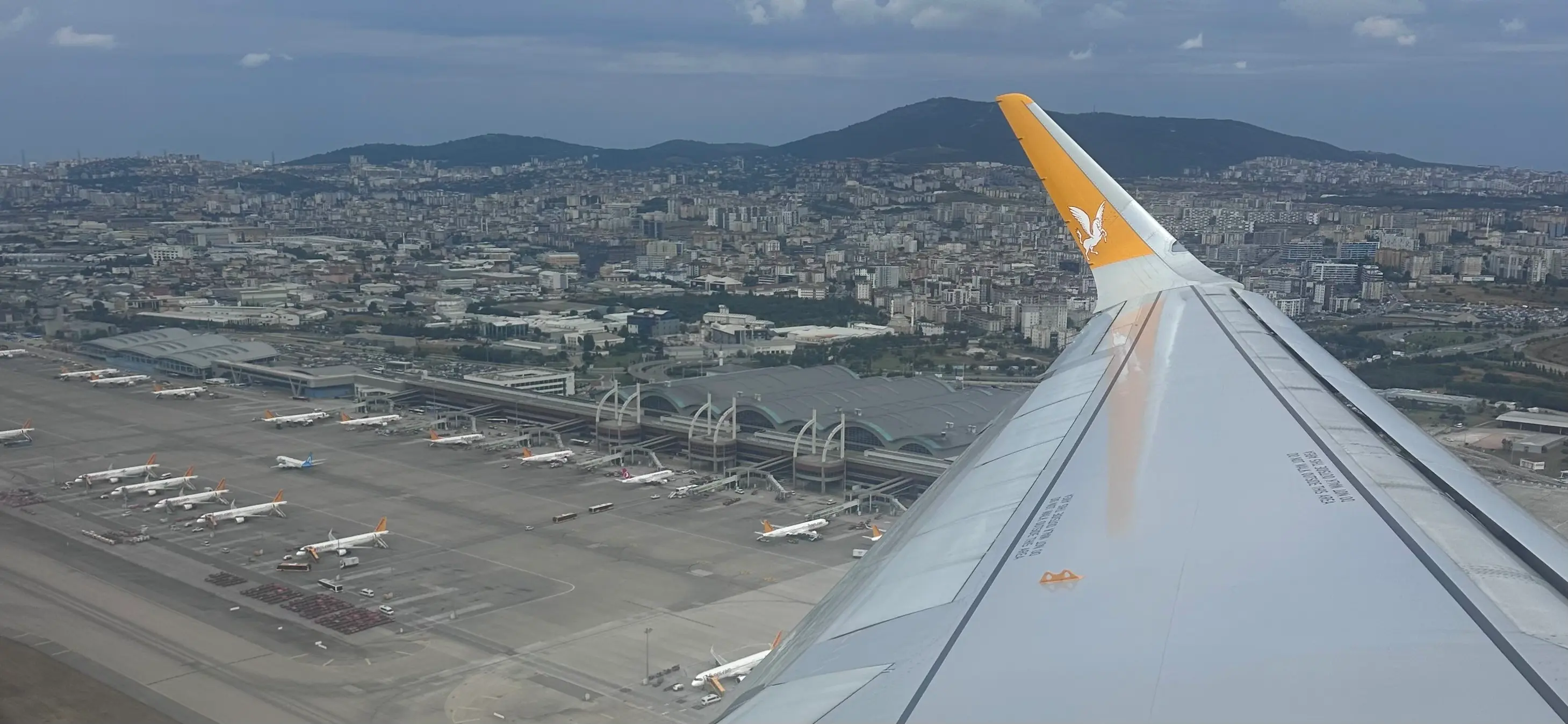 Passenger view of a Pegasus Airlines take-off from Sabiha Gökçen International Airport